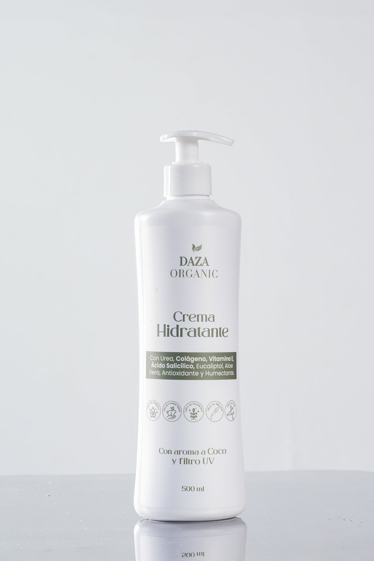 Crema Hidratante de Daza Organic de 500 ml con aroma a coco y filtro UV, en frasco blanco con bomba dosificadora sobre fondo gris claro.